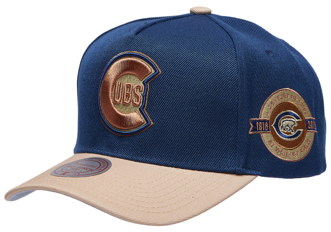 Mitchell & Ness Cubs Navy & Tan Pro Pinch Cap Image 1 of 5. Tap to open photo gallery.