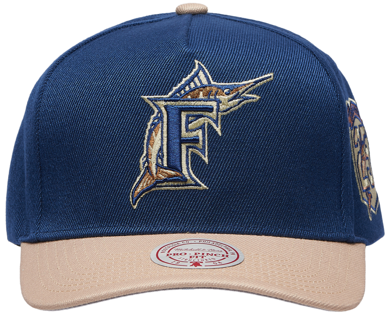 Mitchell & Ness Marlins Navy & Tan Pro Pinch Cap Image 2 of 5. Tap to open photo gallery.