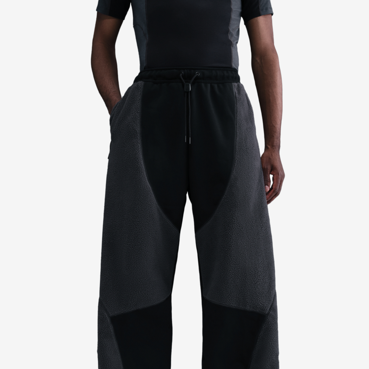 Nike Tech Windwall Open Hem Pants Image 1 of 4. Tap to open photo gallery.