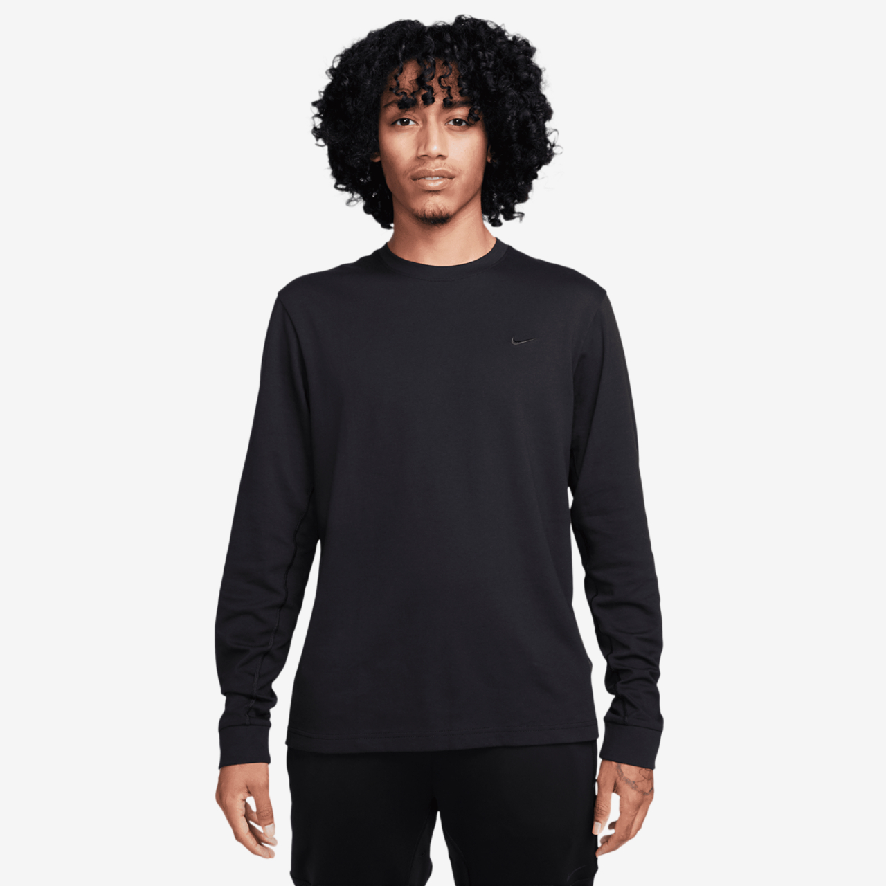 Nike Dri-FIT Primary Long Sleeve Top Image 1 of 4. Tap to open photo gallery.