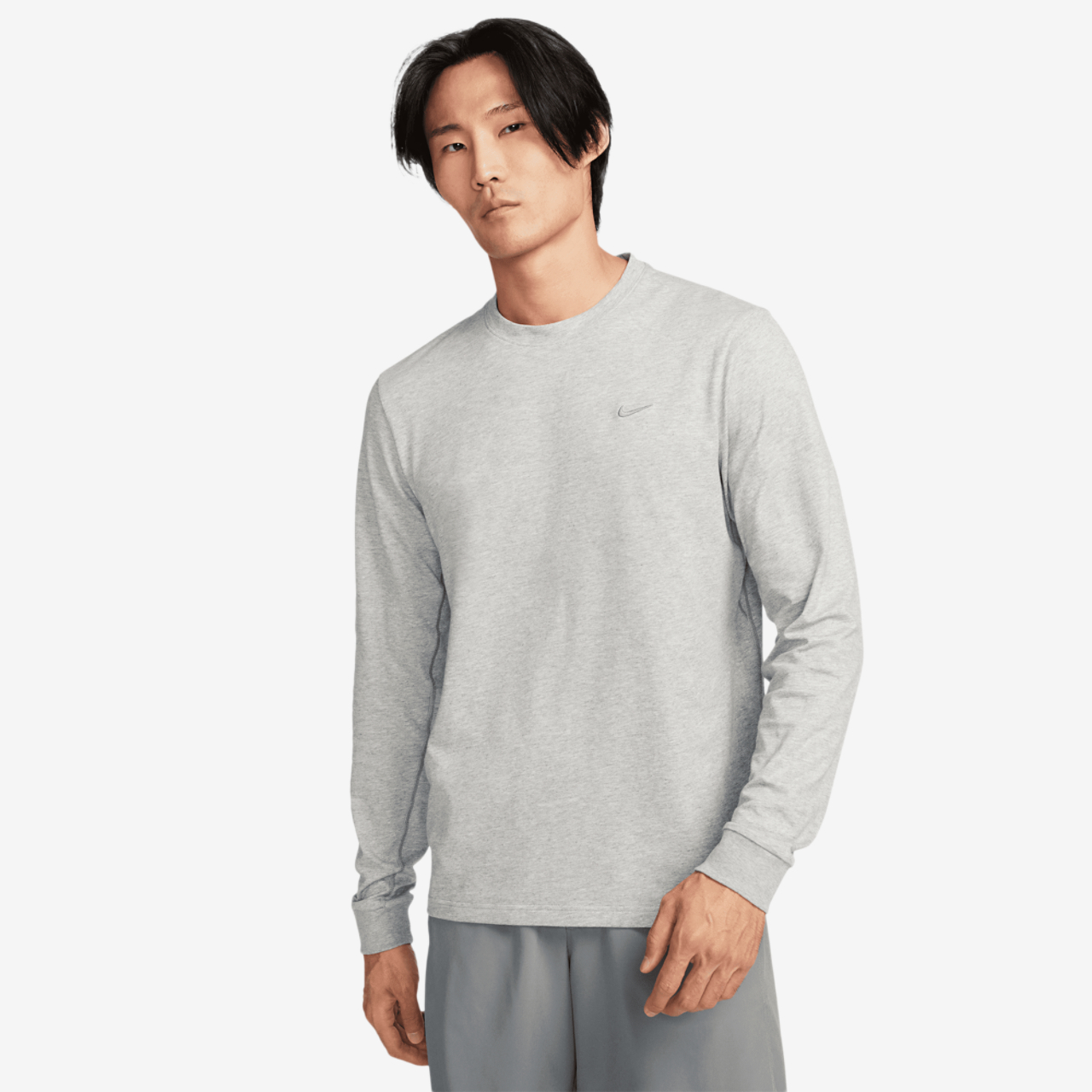 Nike Dri-FIT Primary Long Sleeve Top Image 1 of 4. Tap to open photo gallery.