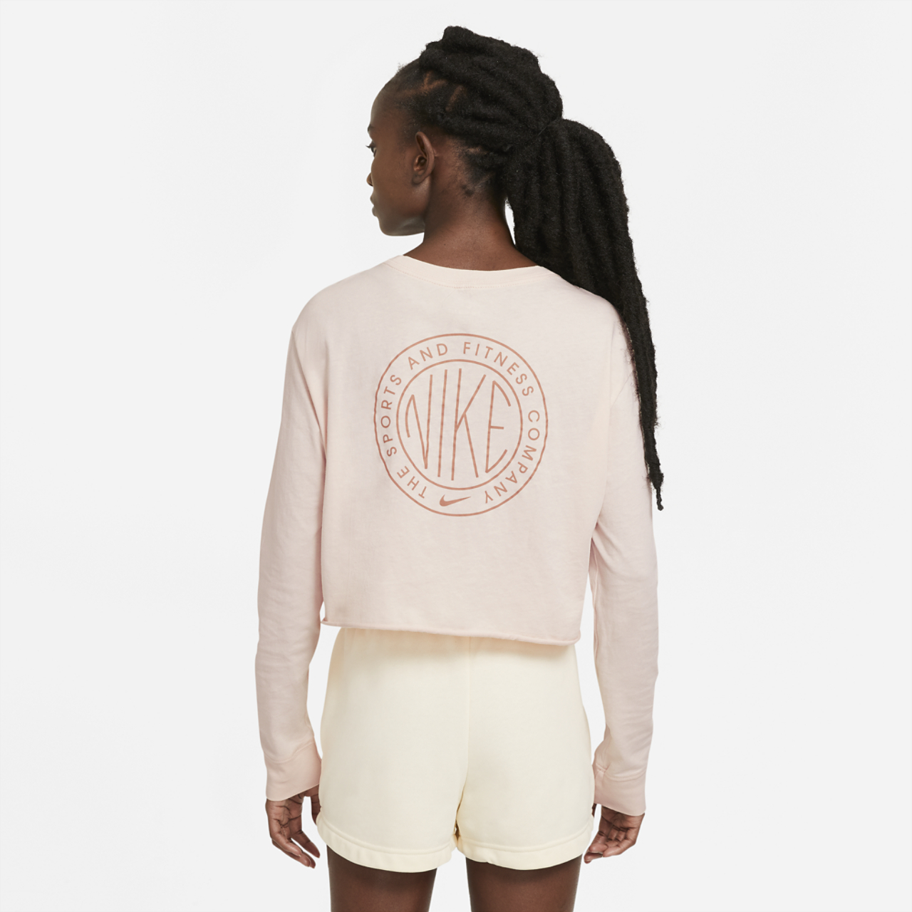 Nike Femme 2 Long Sleeve Cropped T-Shirt Image 2 of 2. Tap to open photo gallery.