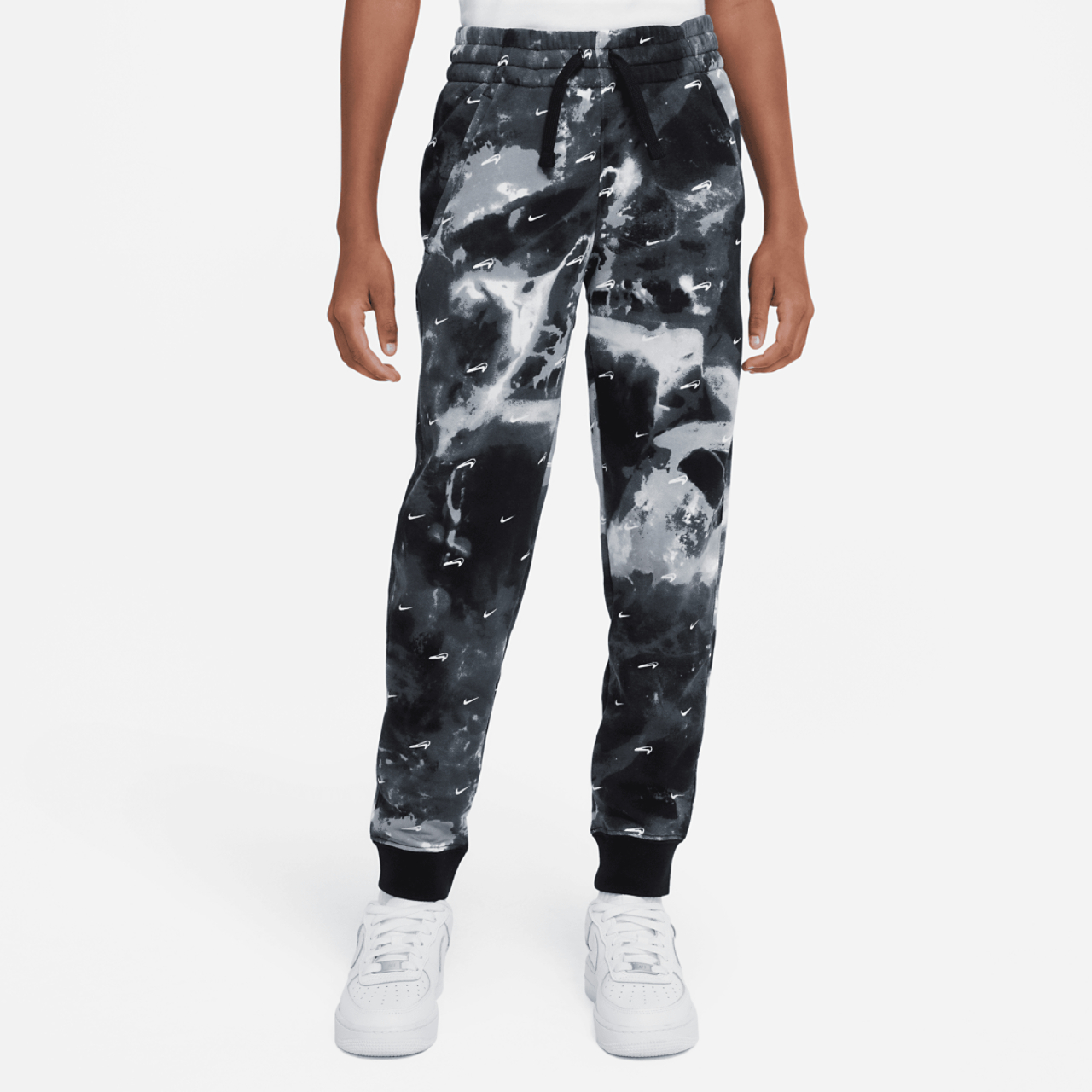 Nike Club Futura AOP Joggers Image 1 of 4. Tap to open photo gallery.