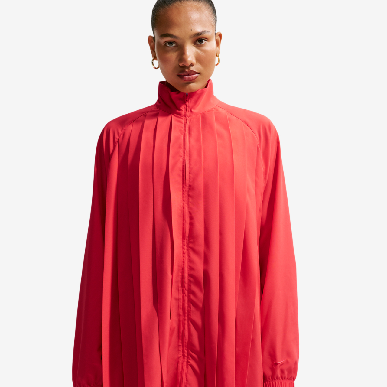 Nike NSW LS Pleated Mini Dress Image 1 of 4. Tap to open photo gallery.