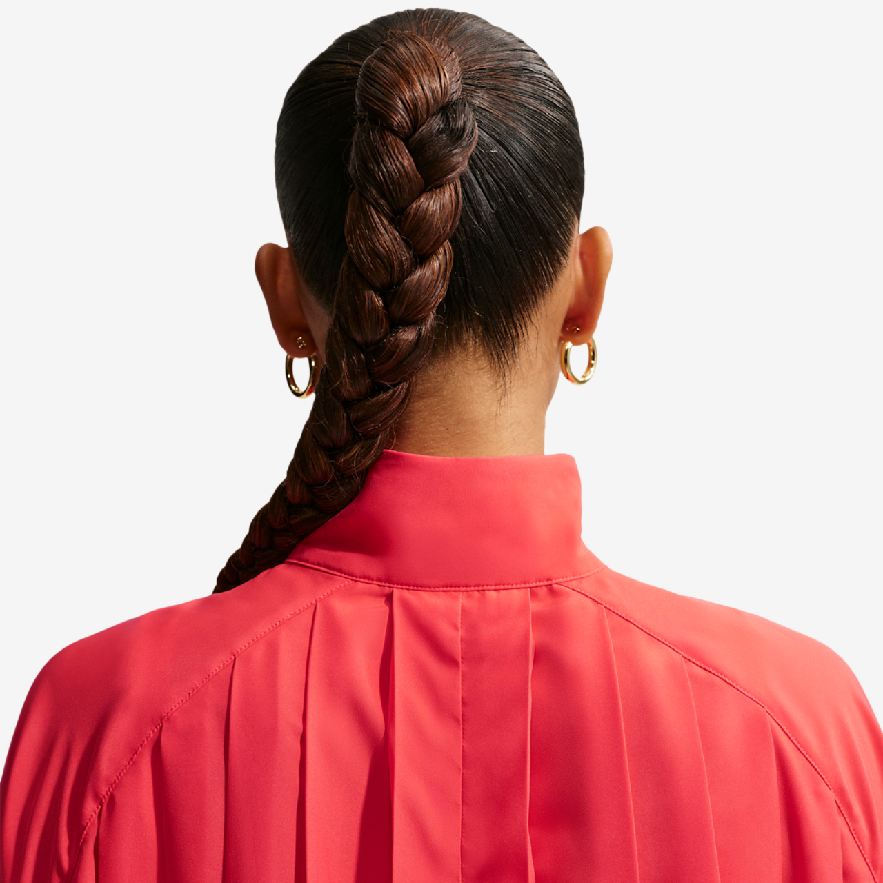Nike NSW LS Pleated Mini Dress Image 2 of 4. Tap to open photo gallery.