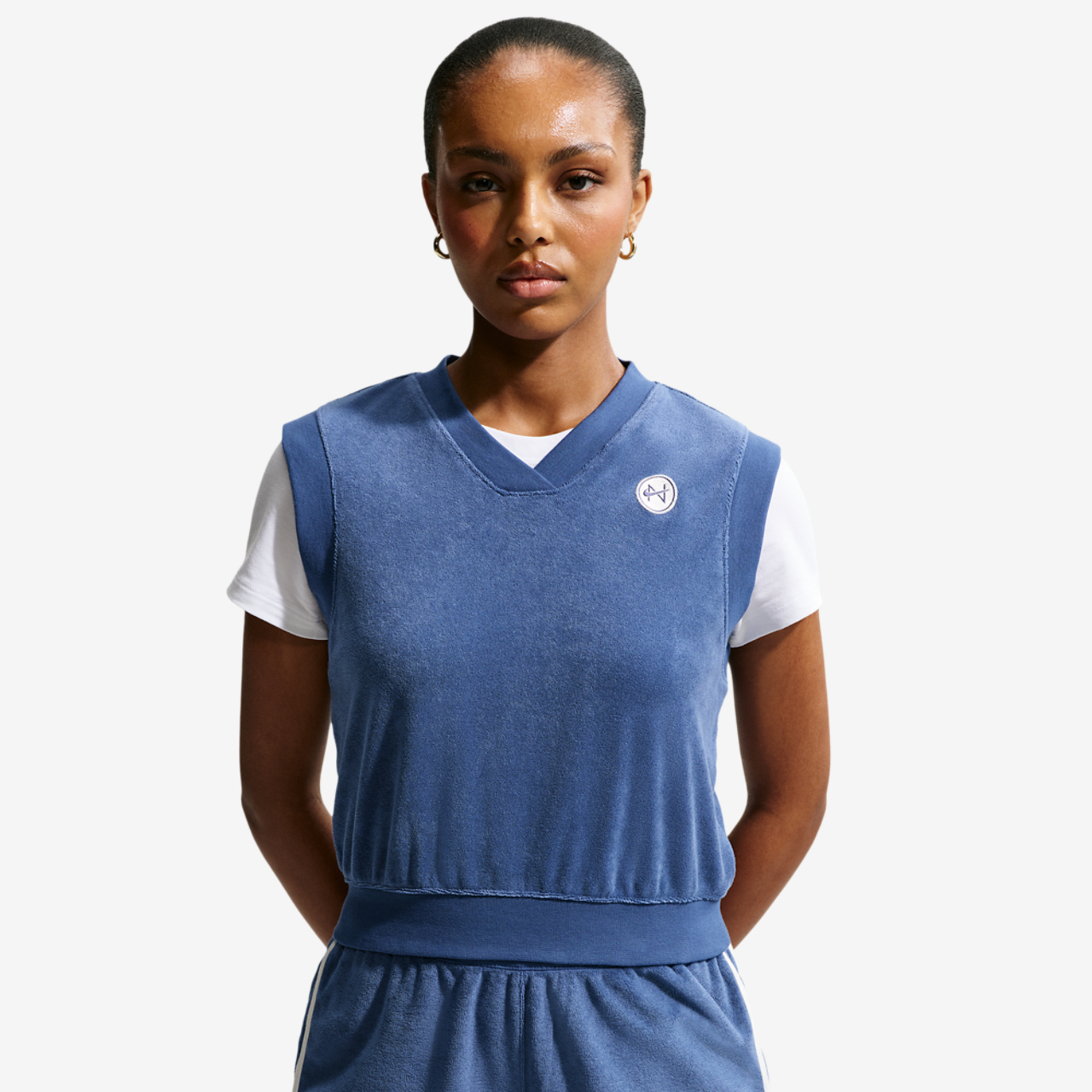 Nike NSW Chill Terry Towel Tank Image 1 of 4. Tap to open photo gallery.