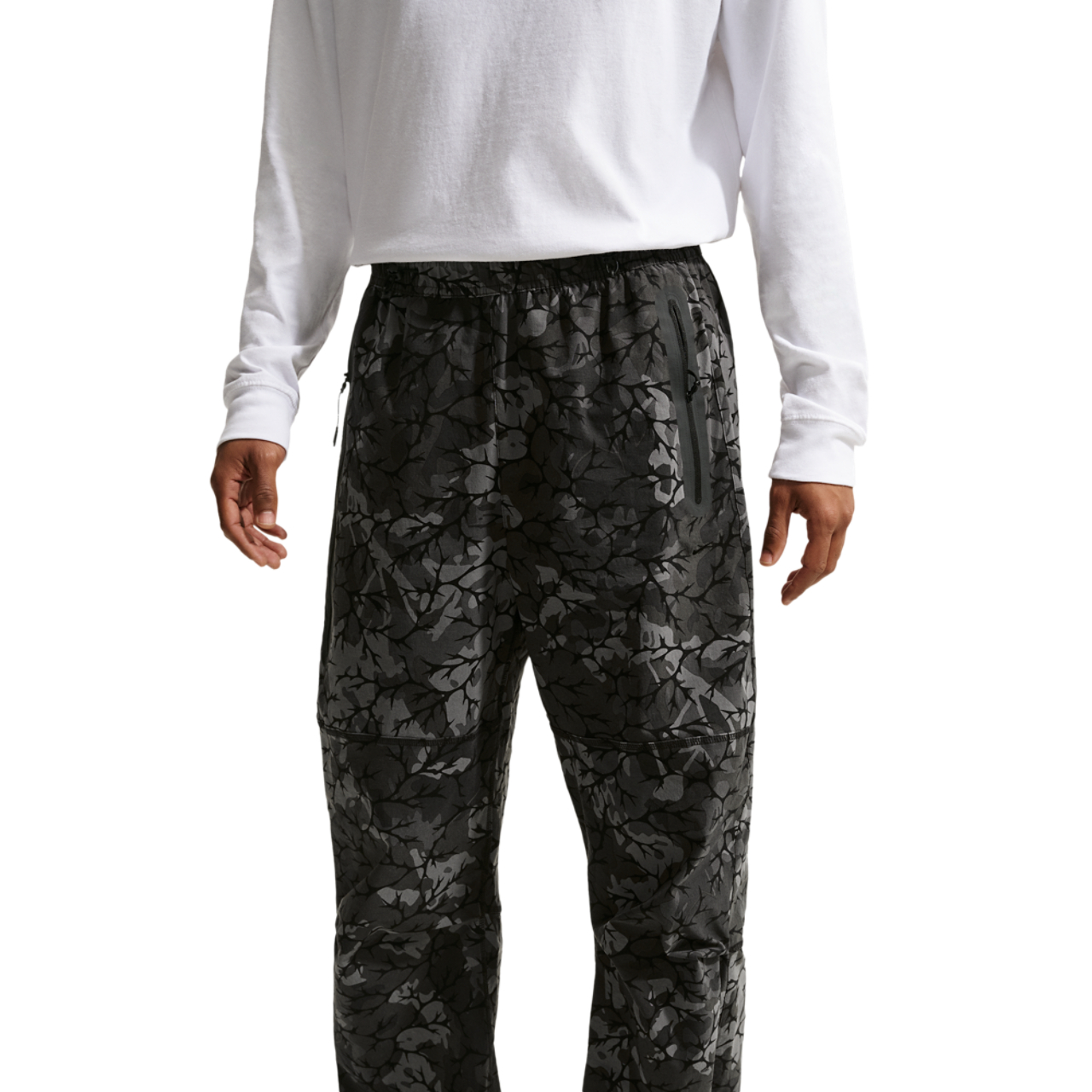 Nike Dri-FIT Tech Woven AOP Pants Image 1 of 4. Tap to open photo gallery.