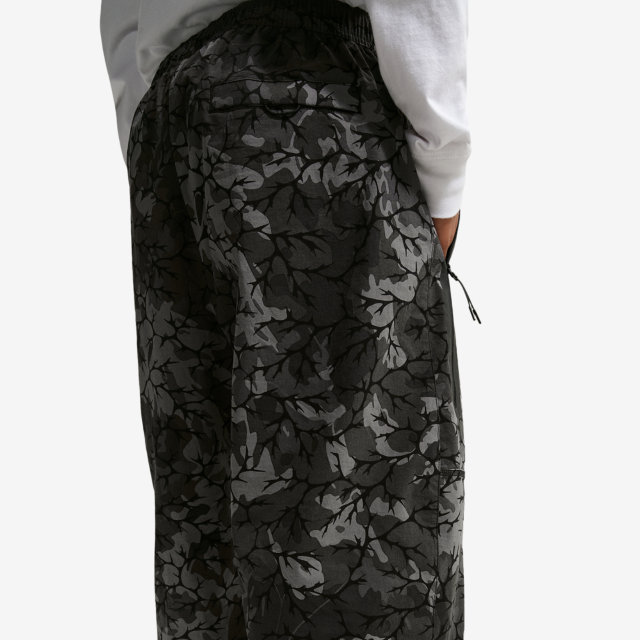 Nike Dri-FIT Tech Woven AOP Pants Image 2 of 4. Tap to open photo gallery.