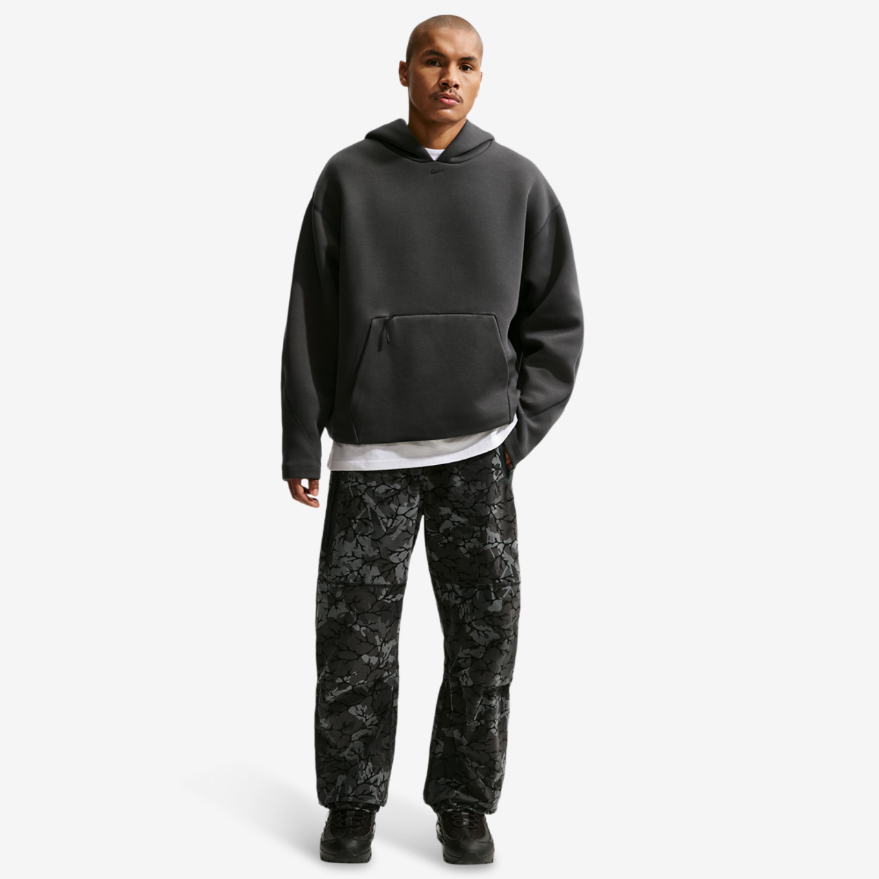 Nike Dri-FIT Tech Woven AOP Pants Image 3 of 4. Tap to open photo gallery.