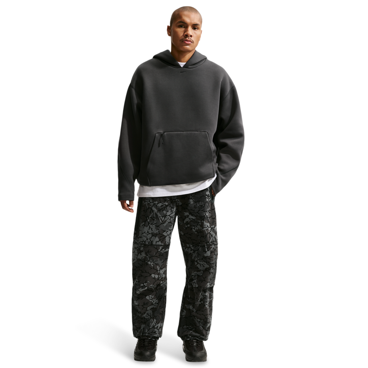 Nike Dri-FIT Tech Woven AOP Pants Image 3 of 4. Tap to open photo gallery.