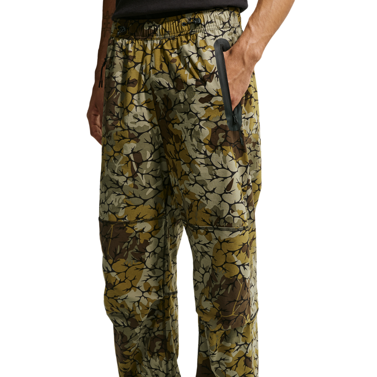 Nike Dri-FIT Tech Woven AOP Pants Image 1 of 4. Tap to open photo gallery.