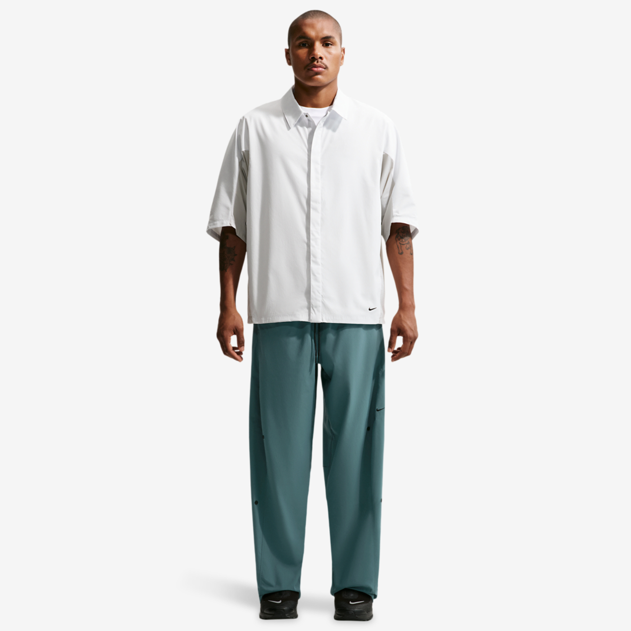 Nike Dri-Fit Tech Helios Sun Pant Image 3 of 4. Tap to open photo gallery.