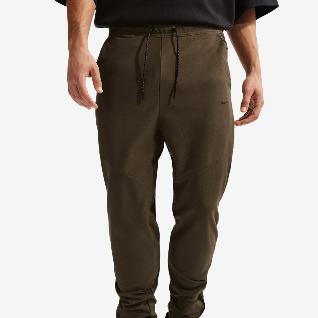 Nike Tech Shori Knit Drill Pant Image 1 of 4. Tap to open photo gallery.
