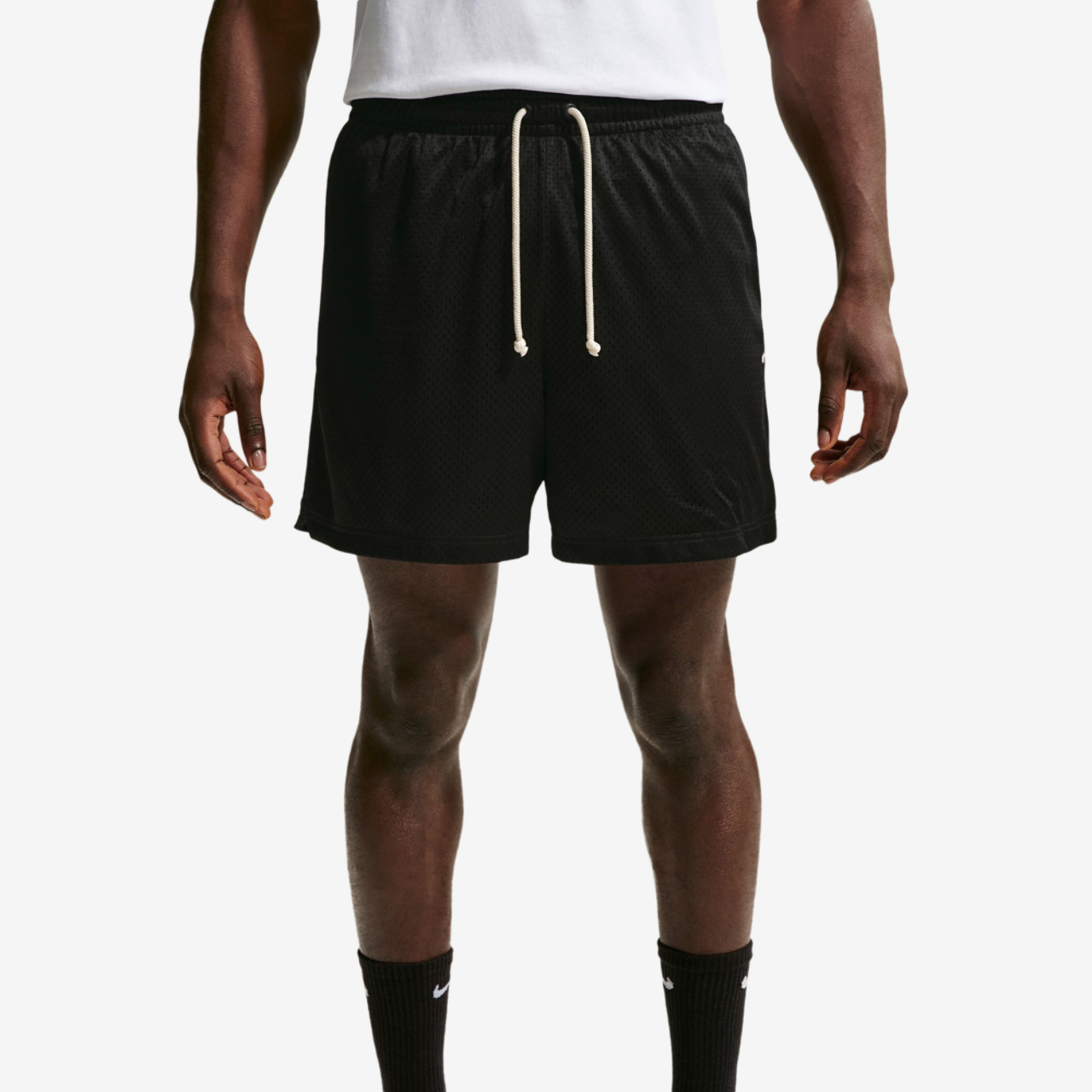 Nike Dri-FIT Standard Issue Mesh 5IN Shorts Image 1 of 4. Tap to open photo gallery.
