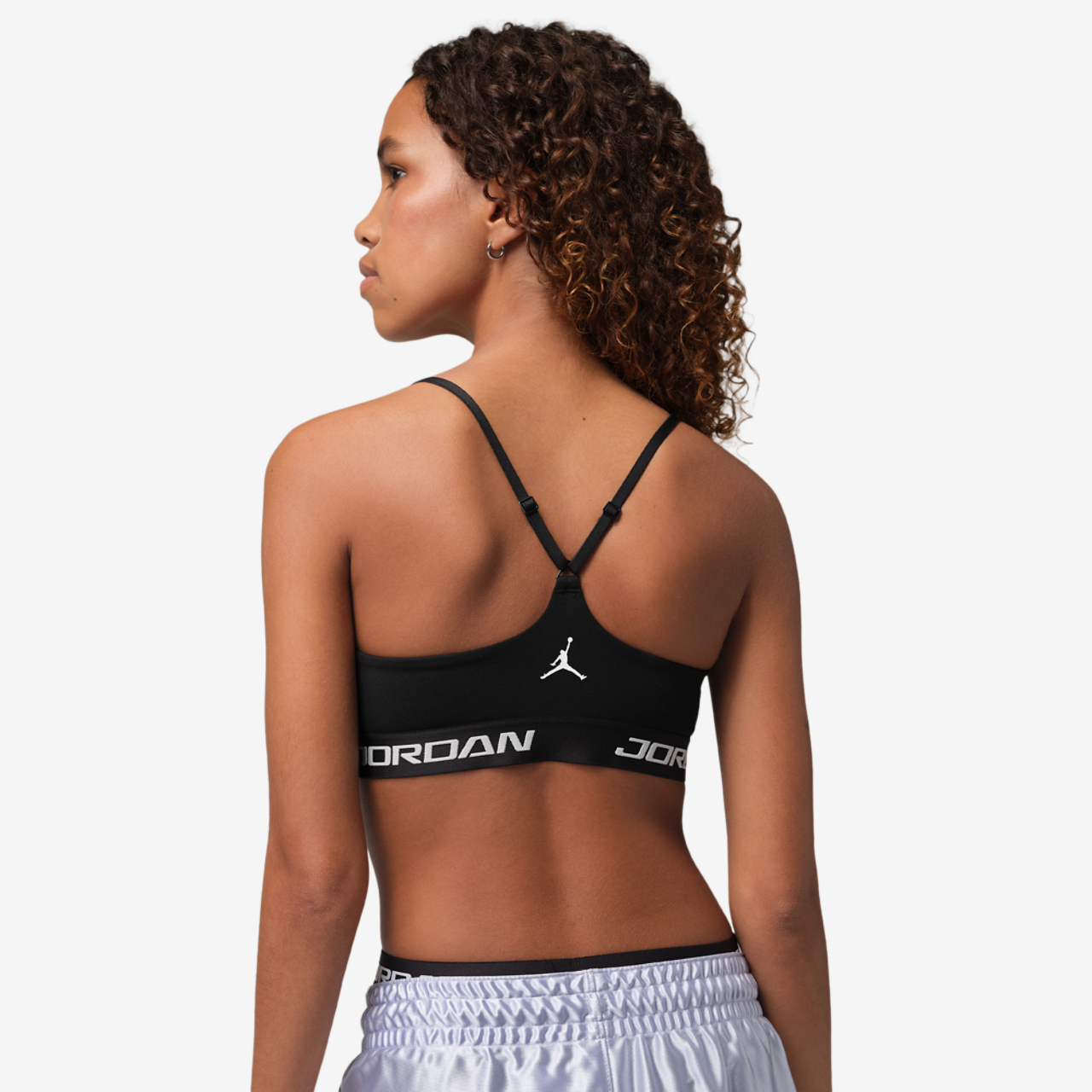 Jordan Sport Indy Essentials Bra Image 2 of 4. Tap to open photo gallery.