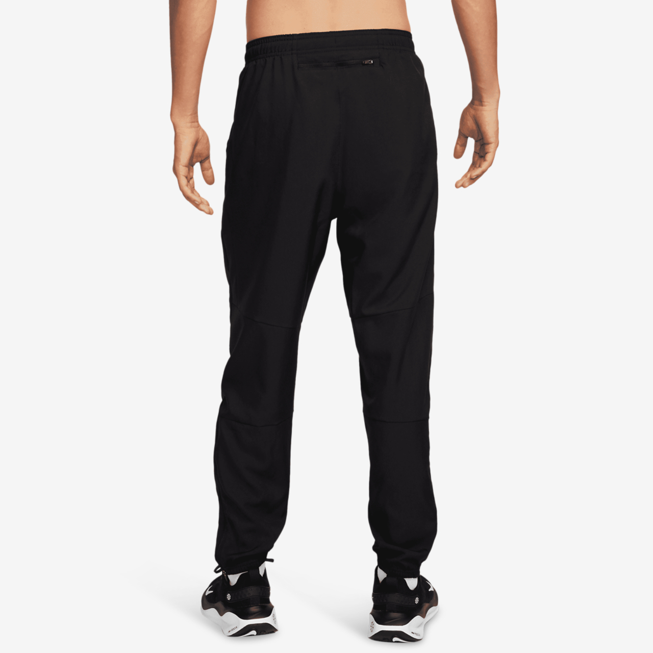 Nike Dri-FIT Challenger Woven Pant Image 2 of 5. Tap to open photo gallery.