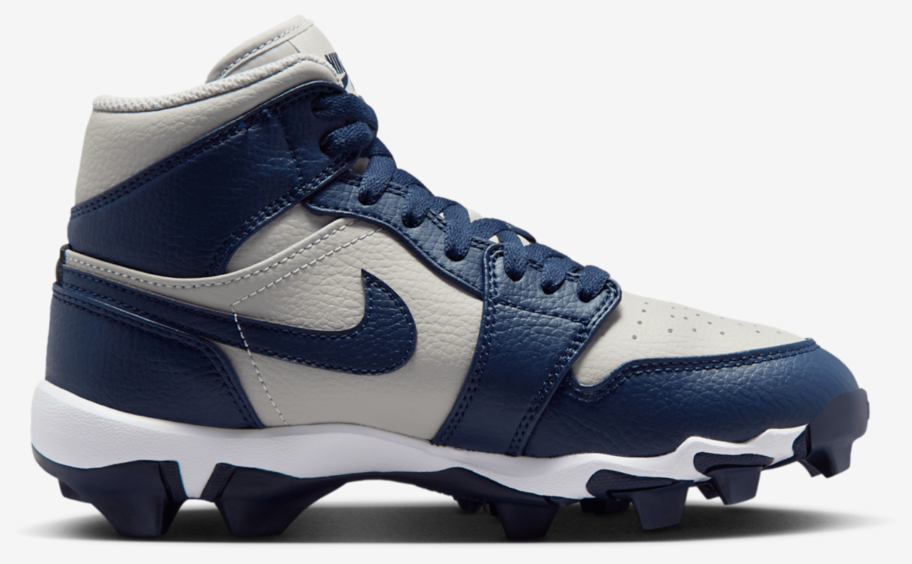 Jordan AJ 1 Mid Cleats Image 1 of 9. Tap to open photo gallery.