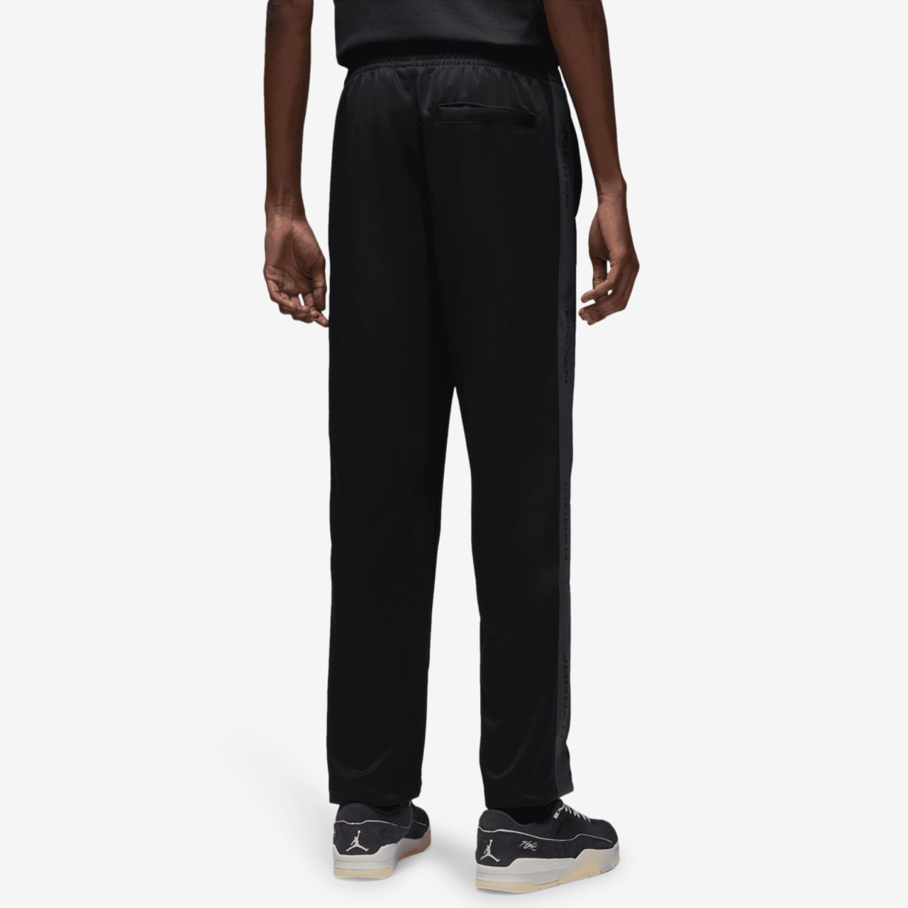 Jordan Essential Track Suit Pants Image 2 of 7. Tap to open photo gallery.
