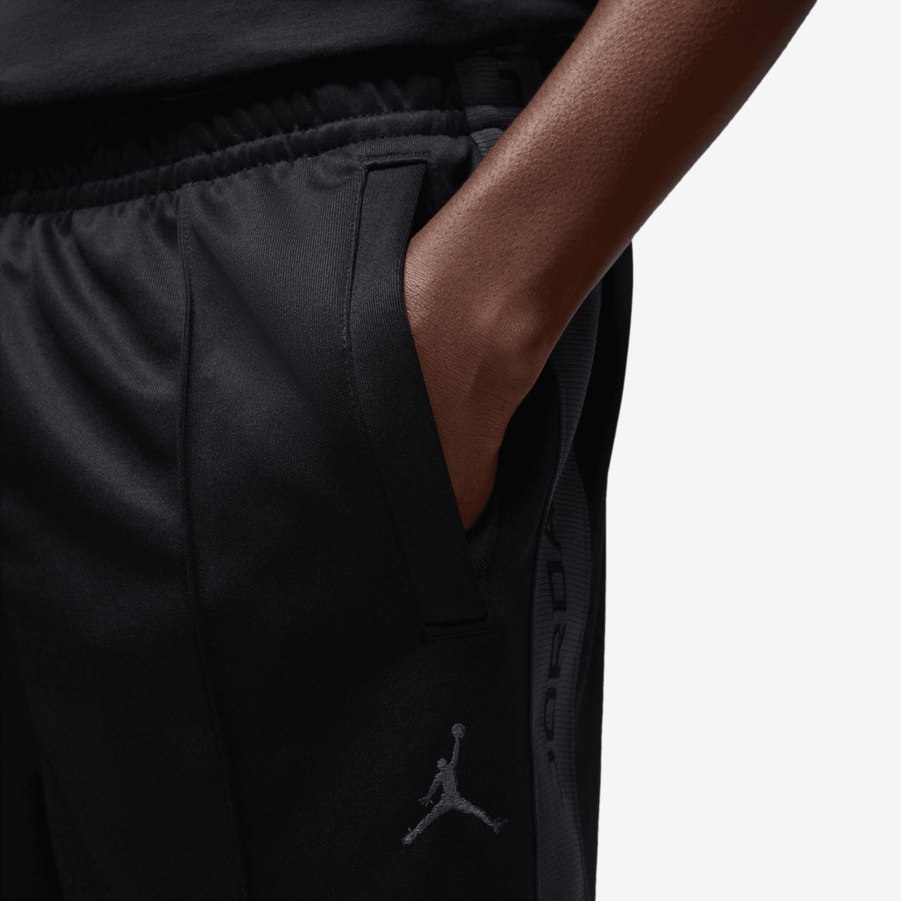 Jordan Essential Track Suit Pants Image 5 of 7. Tap to open photo gallery.