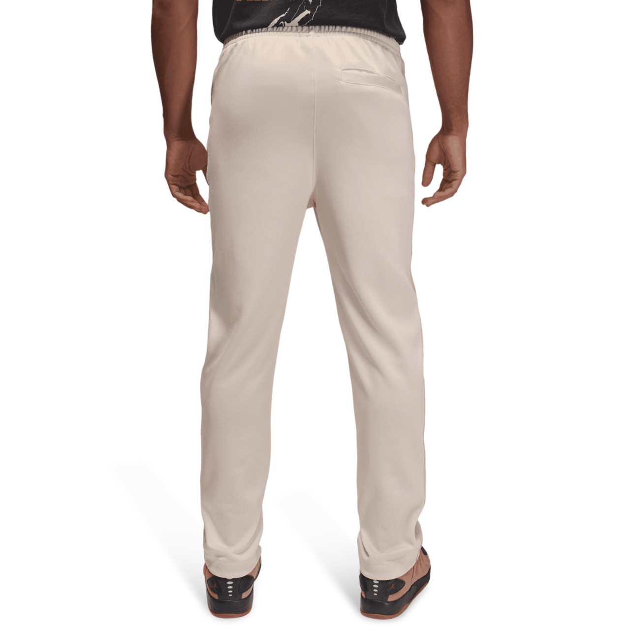 Jordan Essential Track Suit Pants Image 2 of 6. Tap to open photo gallery.