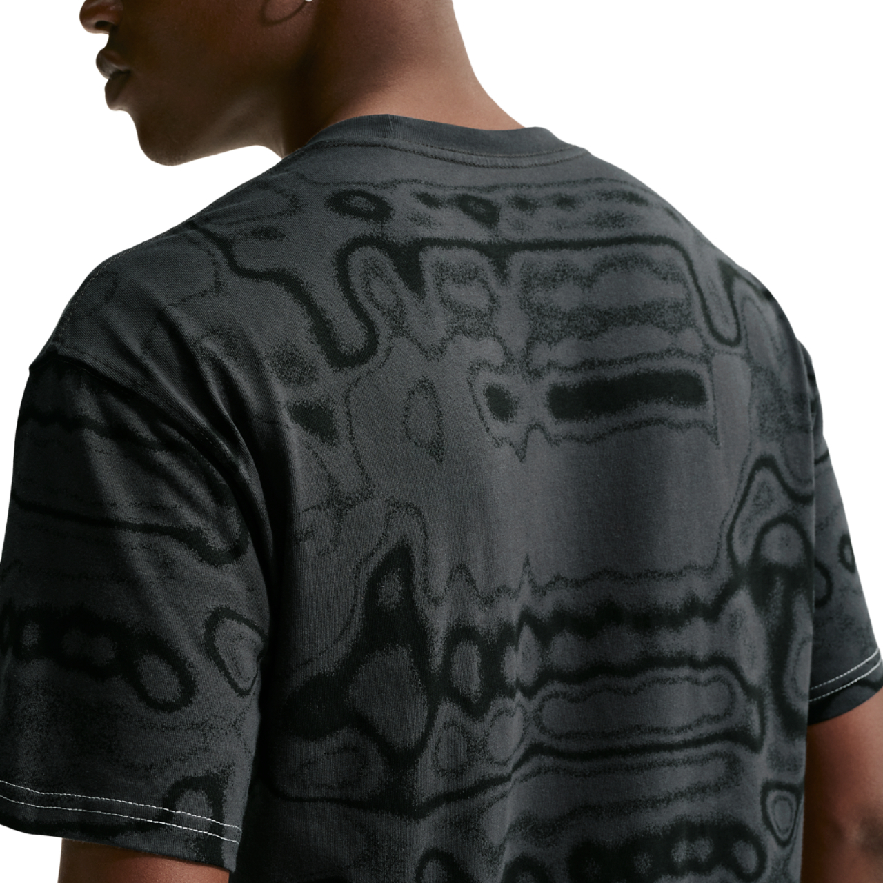 Nike NSW AM Day AOP Loose Tee Image 2 of 4. Tap to open photo gallery.