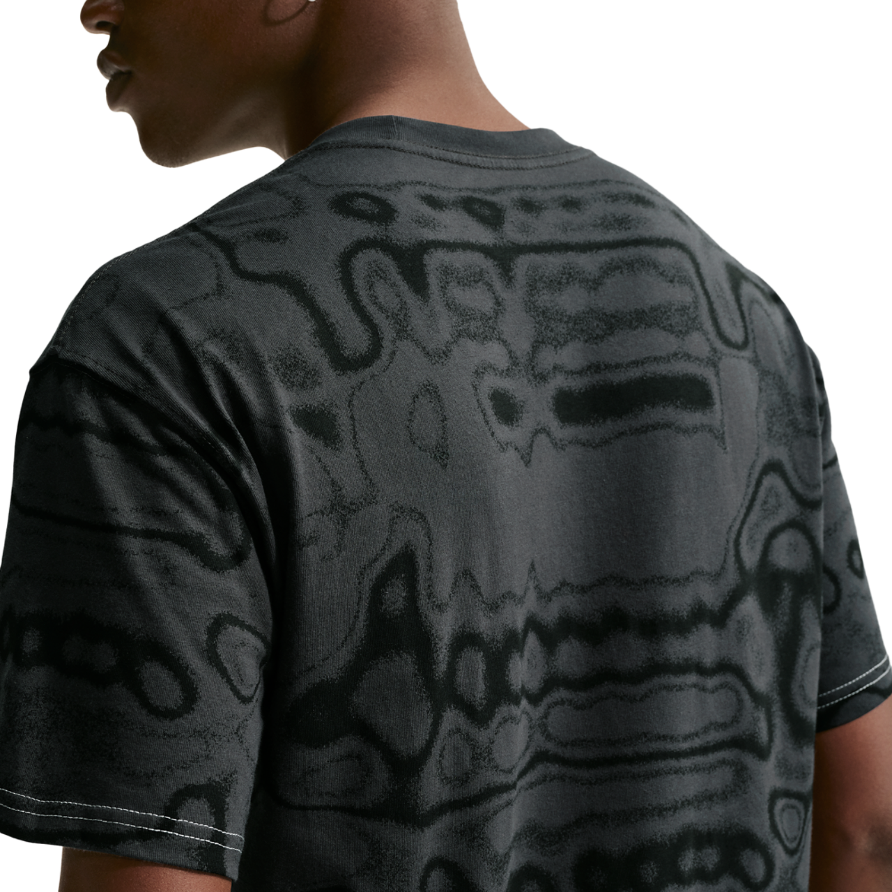 Nike NSW AM Day AOP Loose Tee Image 2 of 4. Tap to open photo gallery.