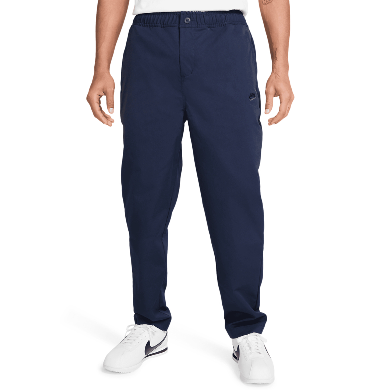 Nike Club Woven Tapered Pants Image 1 of 5. Tap to open photo gallery.