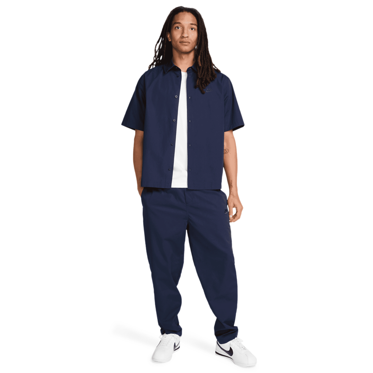 Nike Club Woven Tapered Pants Image 5 of 5. Tap to open photo gallery.