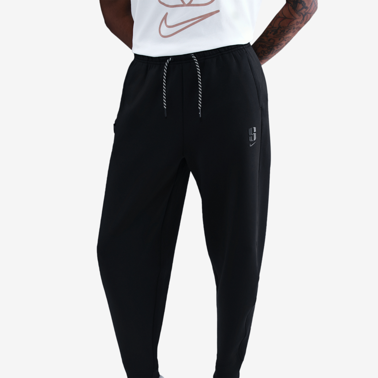 Nike Dri-FIT Sabrina Signature Pants Image 1 of 4. Tap to open photo gallery.