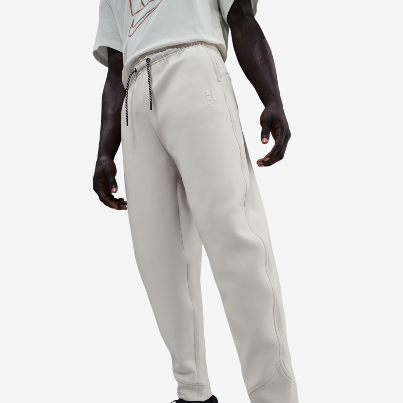 Nike Dri-FIT Sabrina Signature Pants Image 1 of 3. Tap to open photo gallery.