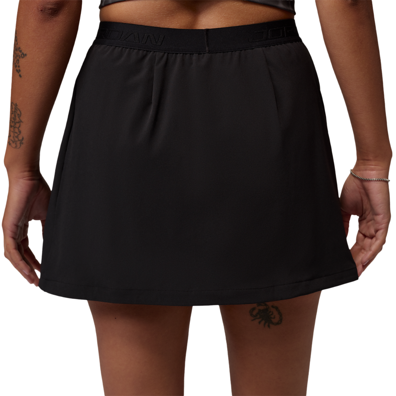Jordan Sport Dri-FIT High Rise Essential Skirt Image 2 of 4. Tap to open photo gallery.
