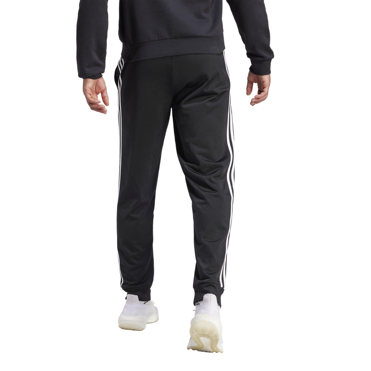 adidas Essentials Warm-Up Tapered 3-Stripes Track Pants Image 2 of 5. Tap to open photo gallery.