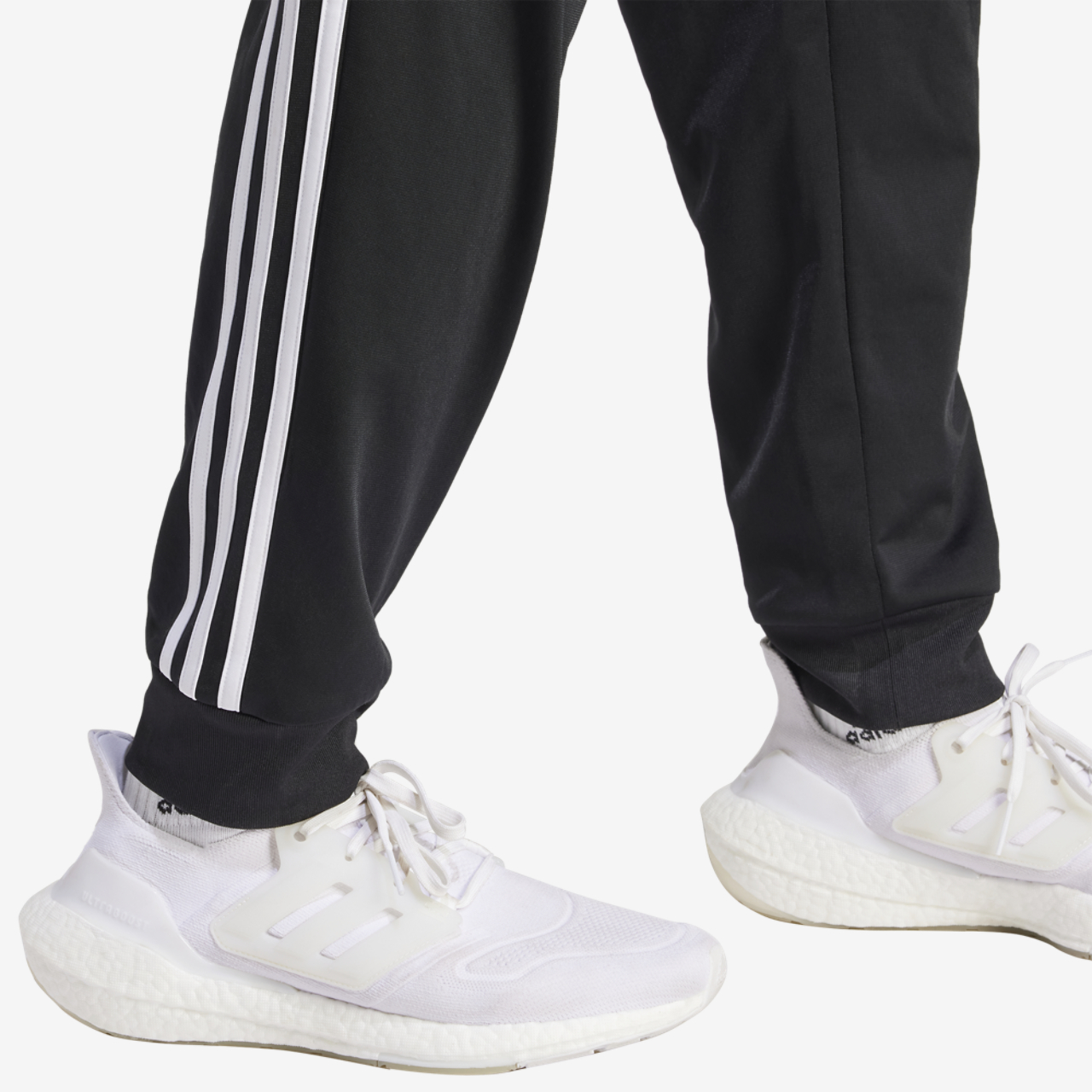adidas Essentials Warm-Up Tapered 3-Stripes Track Pants Image 4 of 5. Tap to open photo gallery.