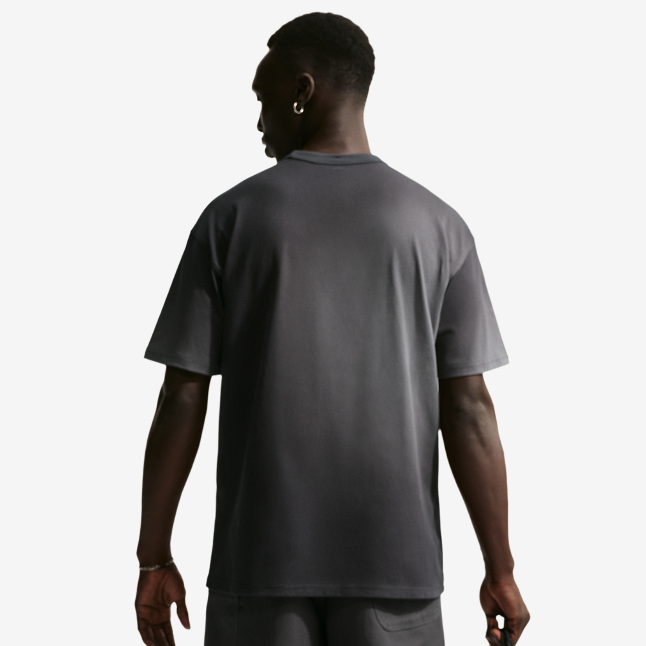 Nike Loose Premium Essential Wash T-Shirt Image 2 of 7. Tap to open photo gallery.