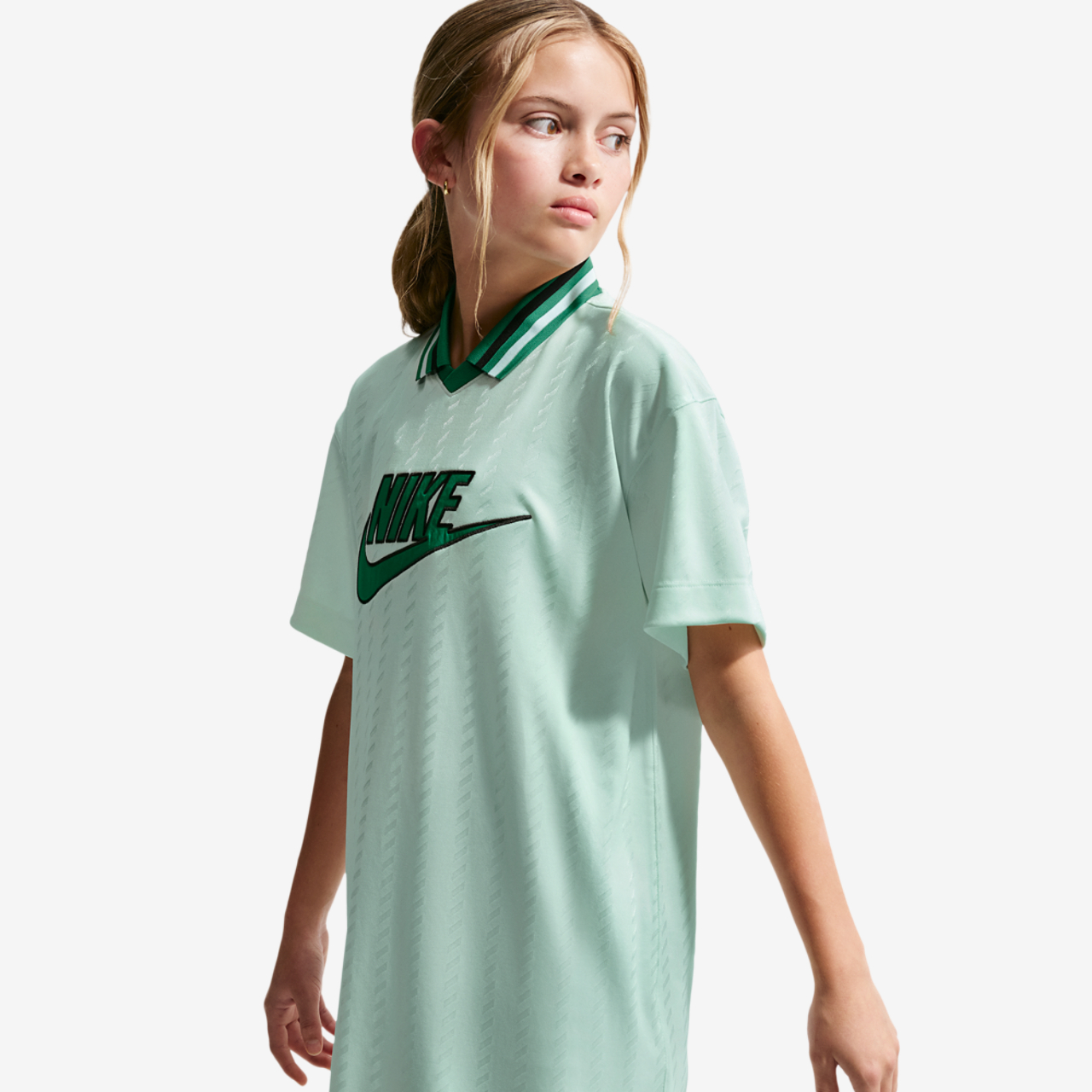 Nike NSW CLN Short Sleeve Jersey Dress Image 1 of 4. Tap to open photo gallery.