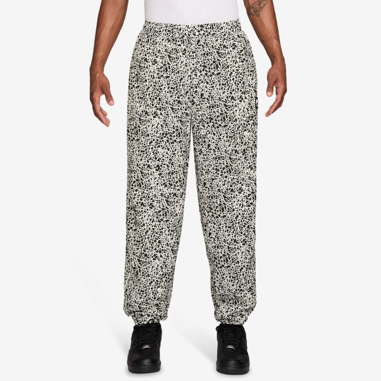 Nike Air Woven AOP TL Pants Image 1 of 3. Tap to open photo gallery.