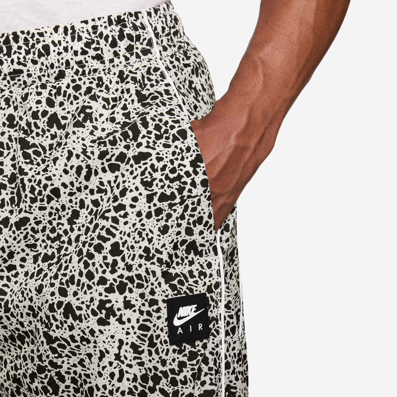 Nike Air Woven AOP TL Pants Image 3 of 3. Tap to open photo gallery.