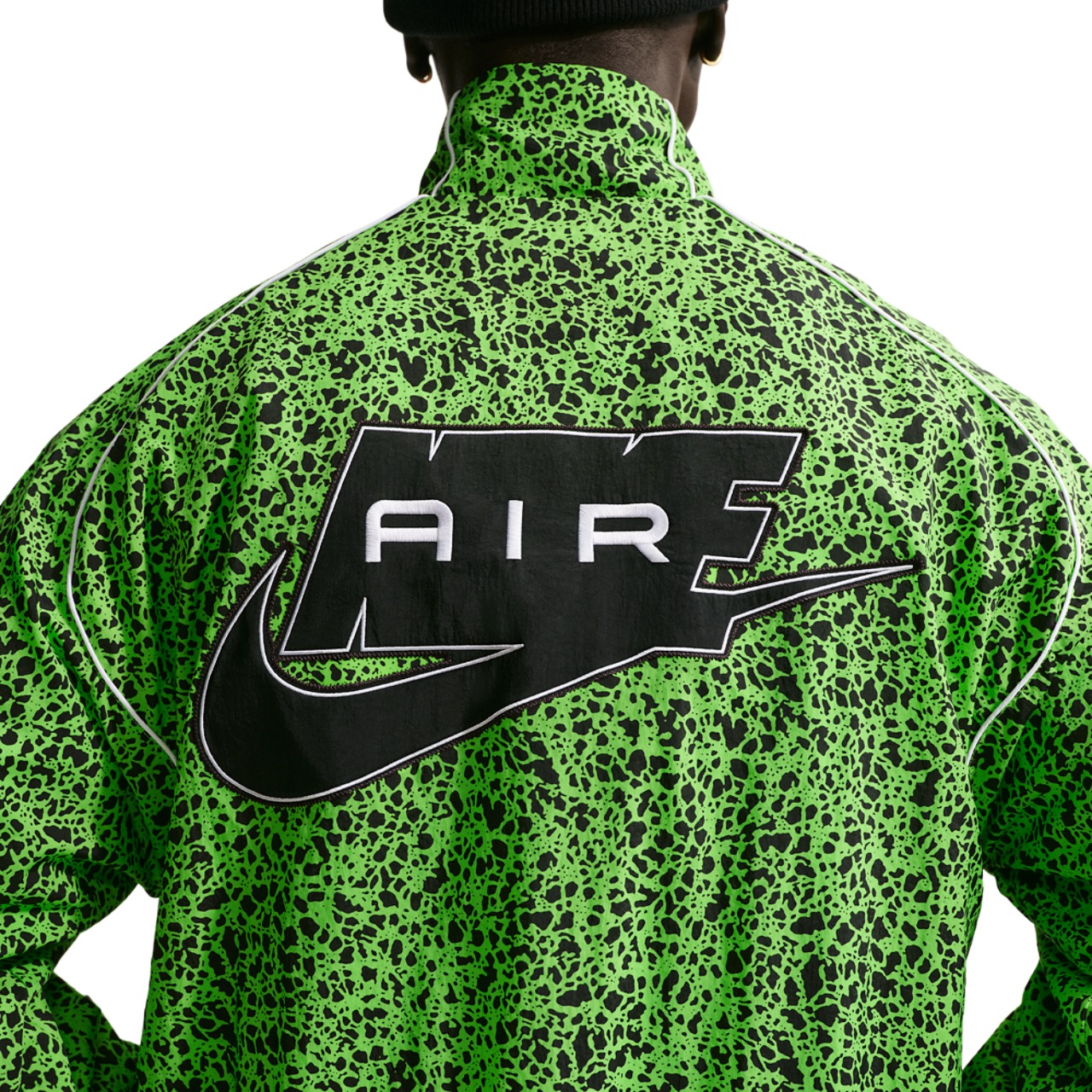 Nike Air Woven AOP Jacket Image 4 of 7. Tap to open photo gallery.