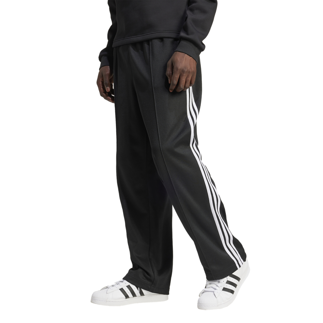 adidas Originals Firebird Adicolor Baggy Track Pants Image 1 of 5. Tap to open photo gallery.