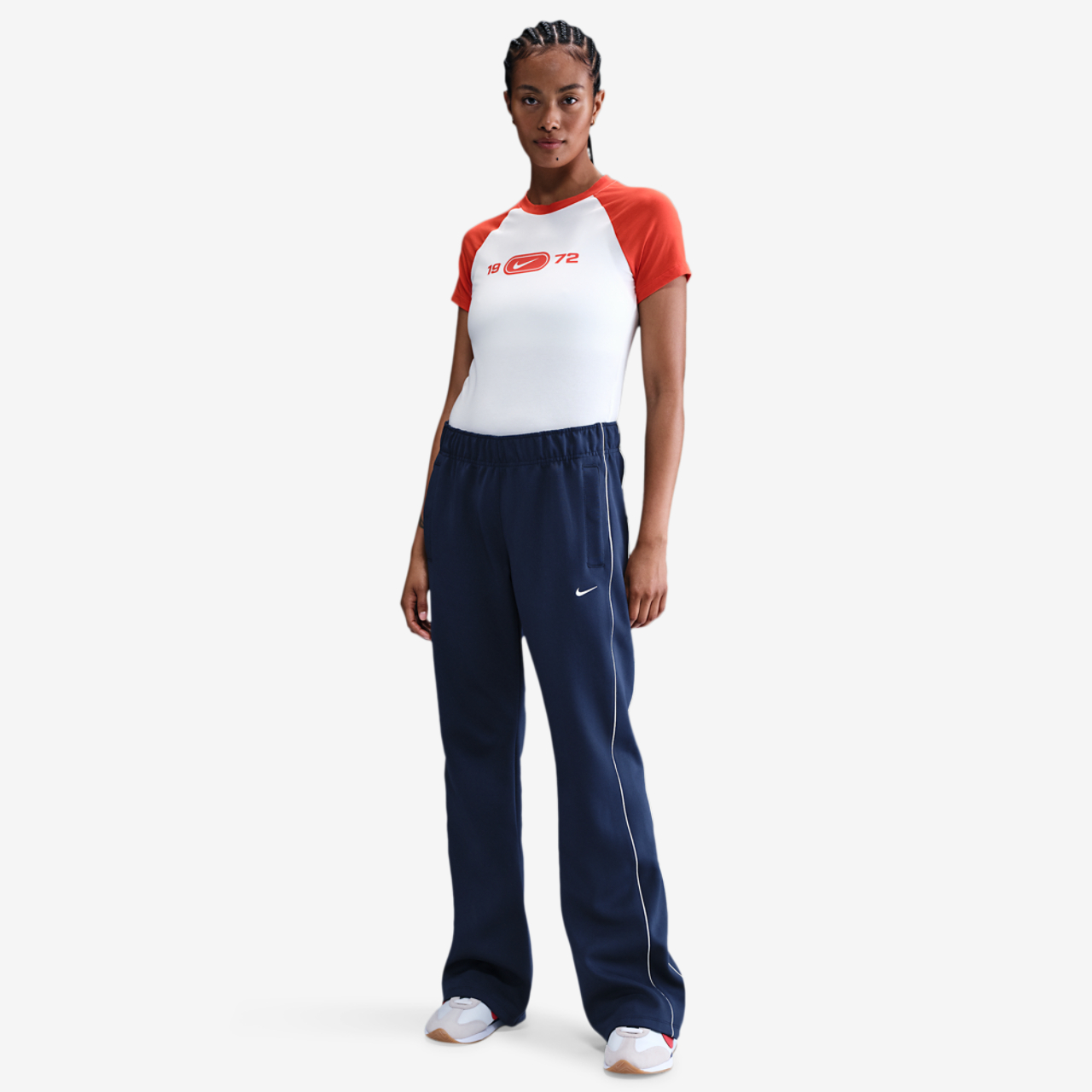 Nike NSW WR Mid Rise Poly Knit Pants Image 1 of 3. Tap to open photo gallery.