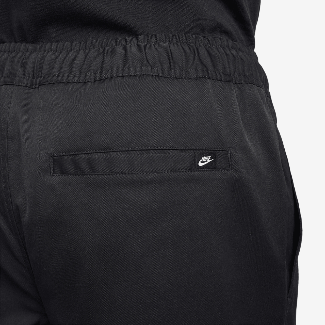 Nike Club Woven Tapered Pants Image 5 of 6. Tap to open photo gallery.