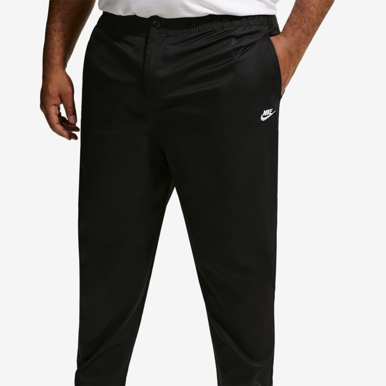 Nike Club Woven Tapered Pants Image 1 of 4. Tap to open photo gallery.