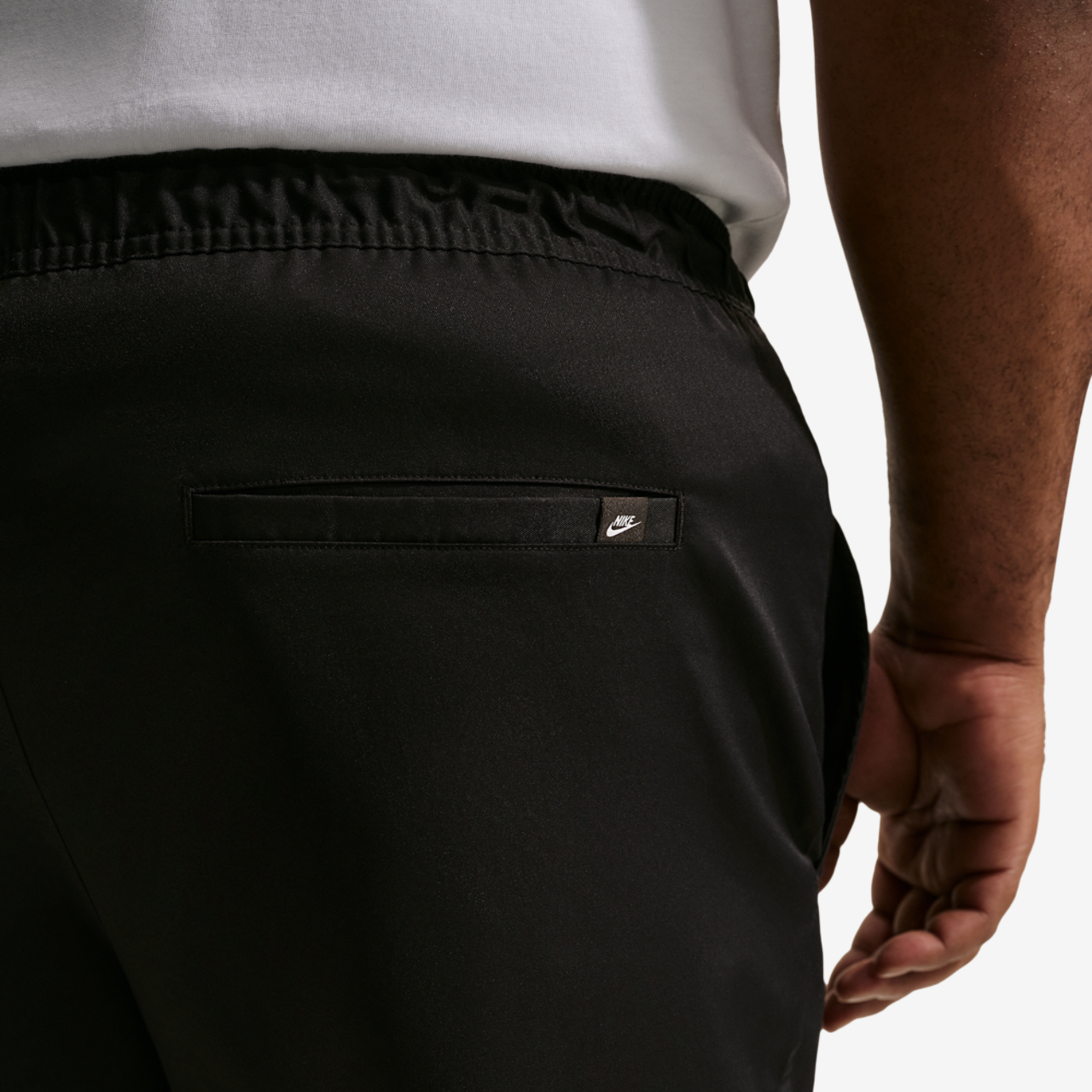 Nike Club Woven Tapered Pants Image 2 of 4. Tap to open photo gallery.