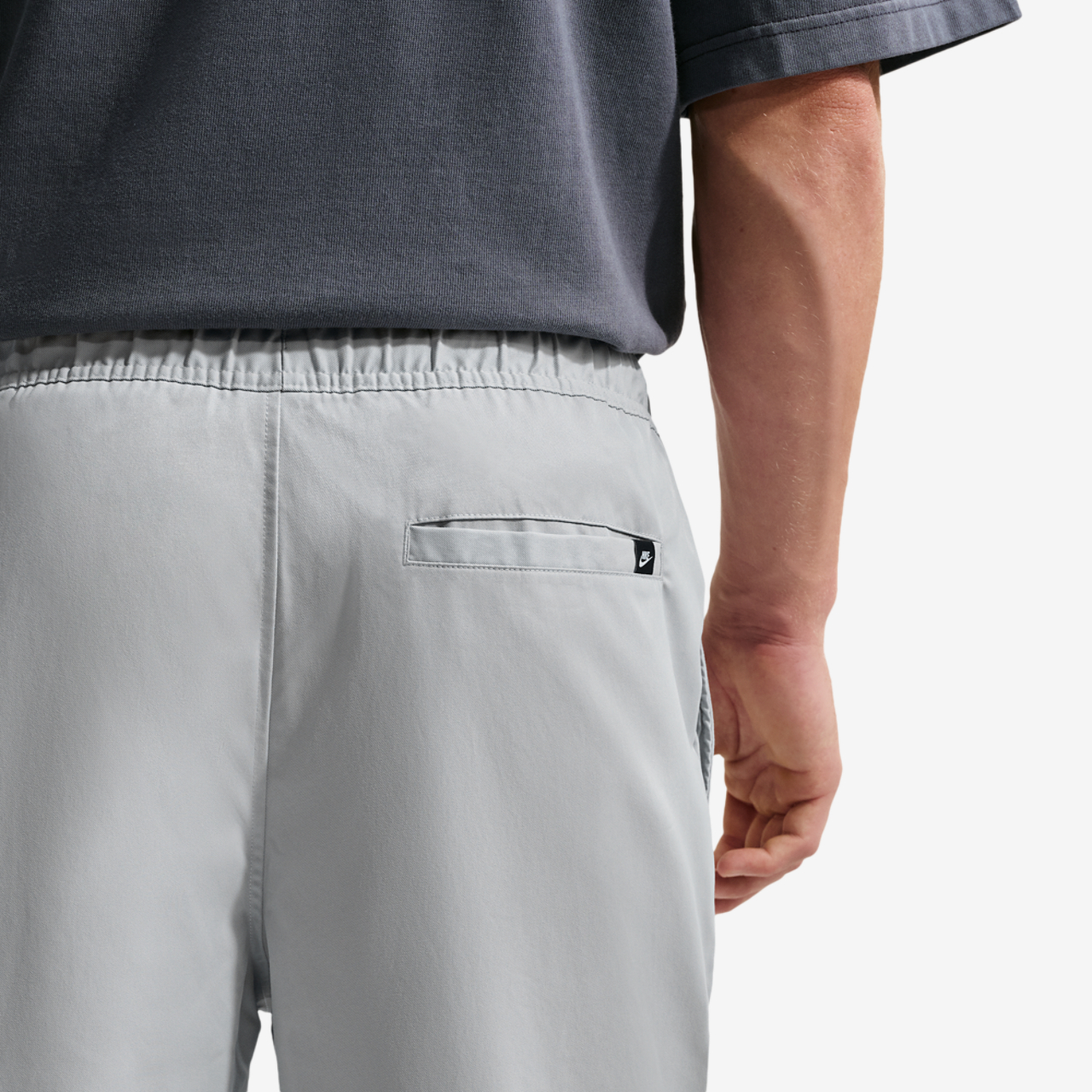 Nike Club Woven Tapered Pants Image 2 of 4. Tap to open photo gallery.