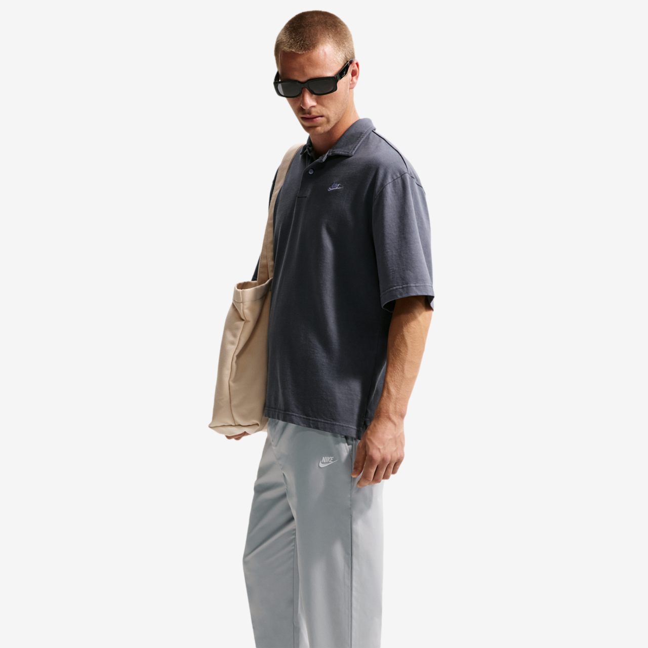 Nike Club Woven Tapered Pants Image 3 of 4. Tap to open photo gallery.
