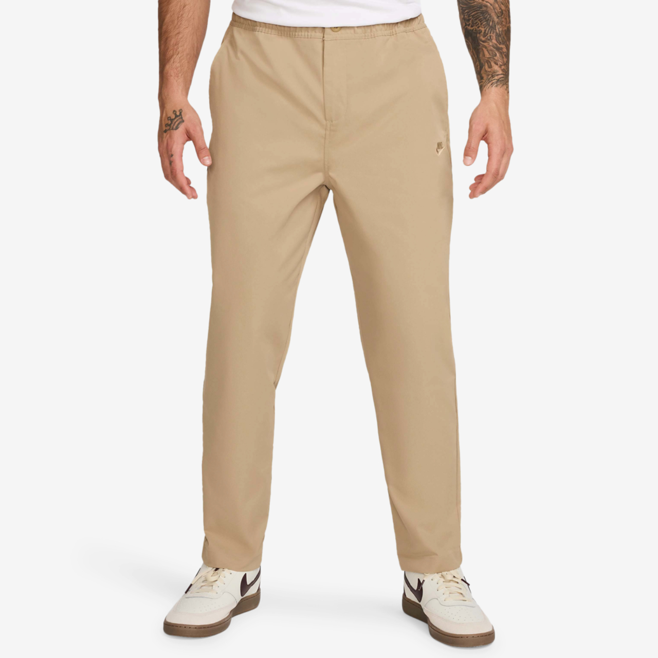 Nike Club Woven Tapered Pants Image 1 of 4. Tap to open photo gallery.