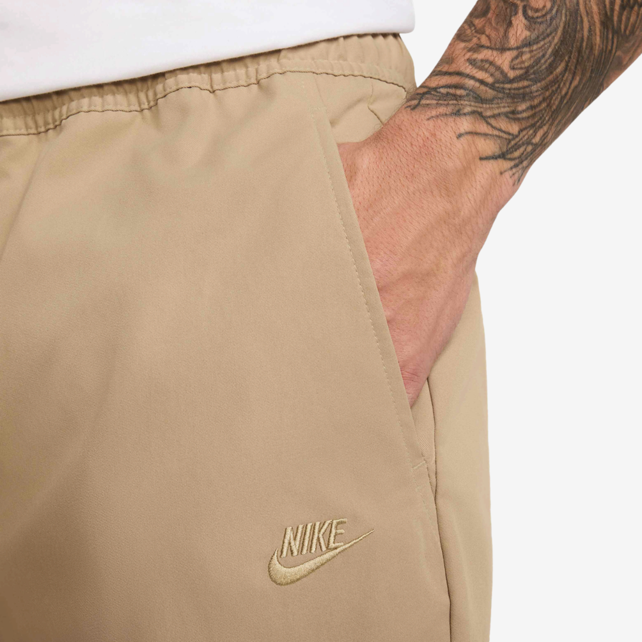 Nike Club Woven Tapered Pants Image 3 of 4. Tap to open photo gallery.