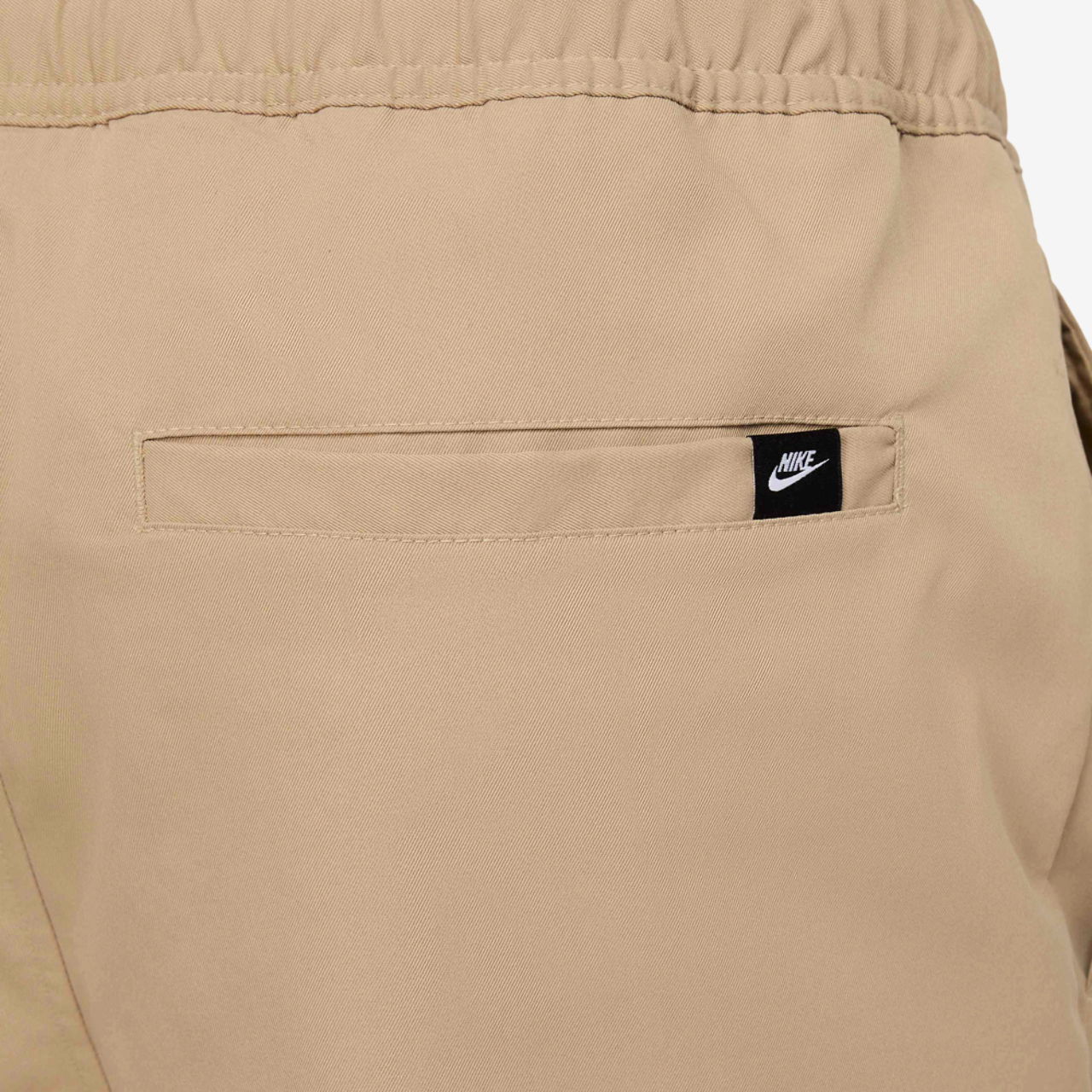 Nike Club Woven Tapered Pants Image 4 of 4. Tap to open photo gallery.