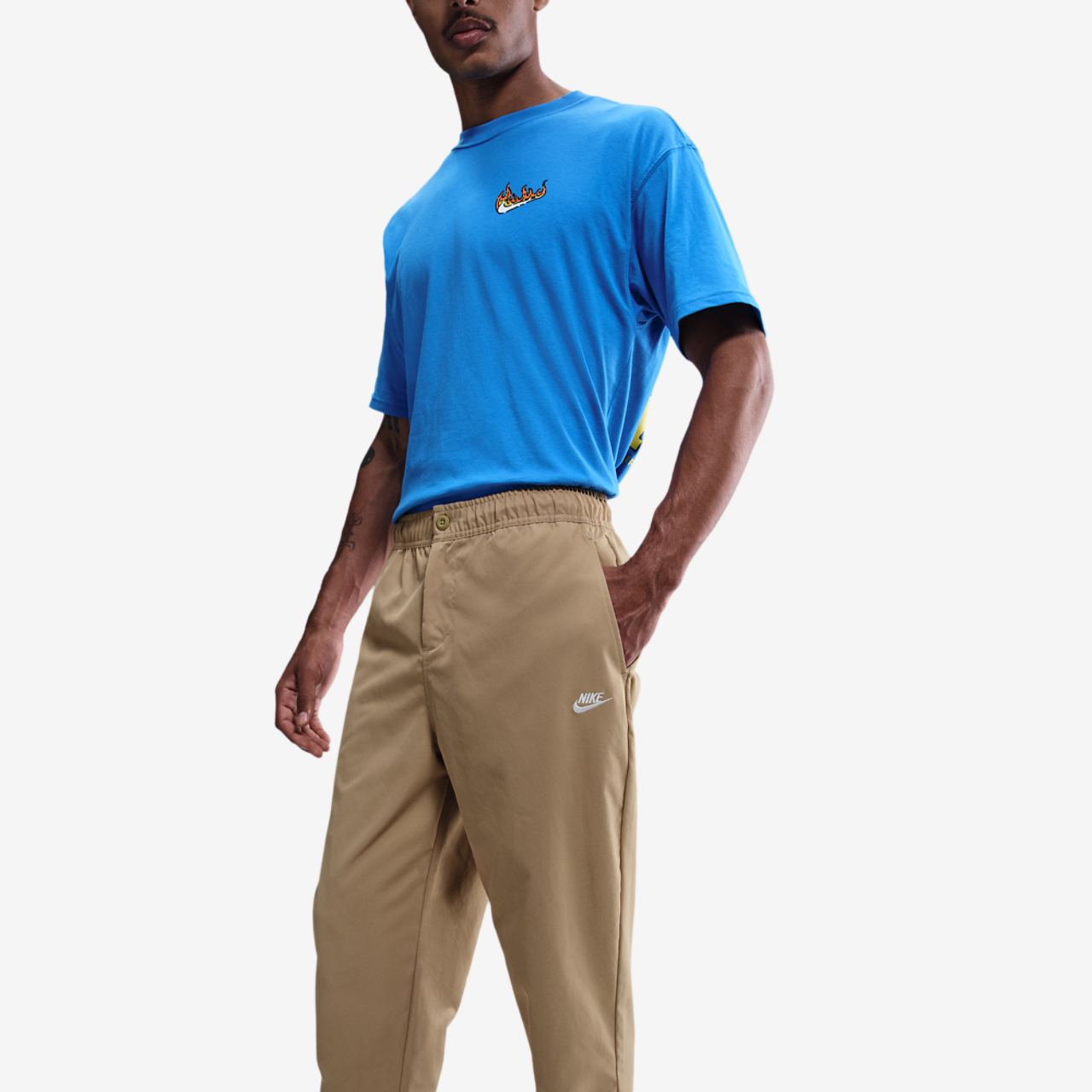 Nike Club Woven Tapered Pants Image 1 of 4. Tap to open photo gallery.