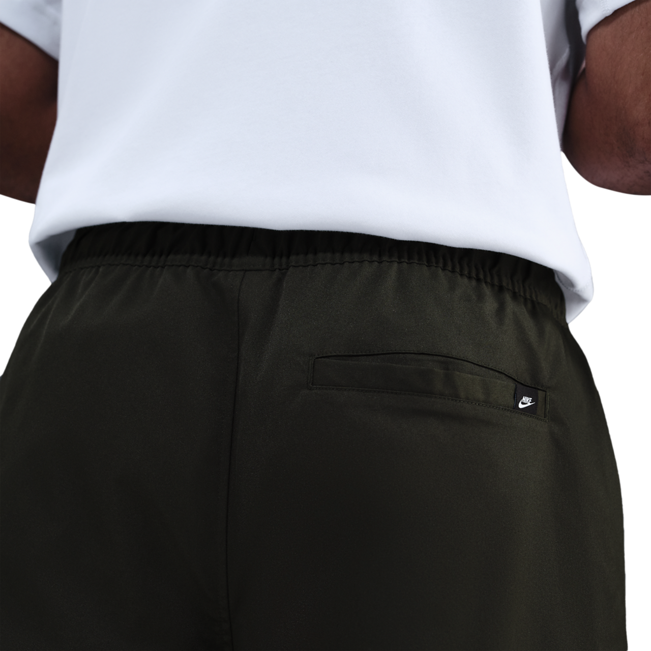 Nike Club Woven Tapered Pants Image 2 of 4. Tap to open photo gallery.